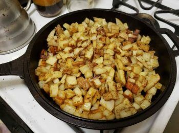 fried potatoes in lodge cast iron skillet